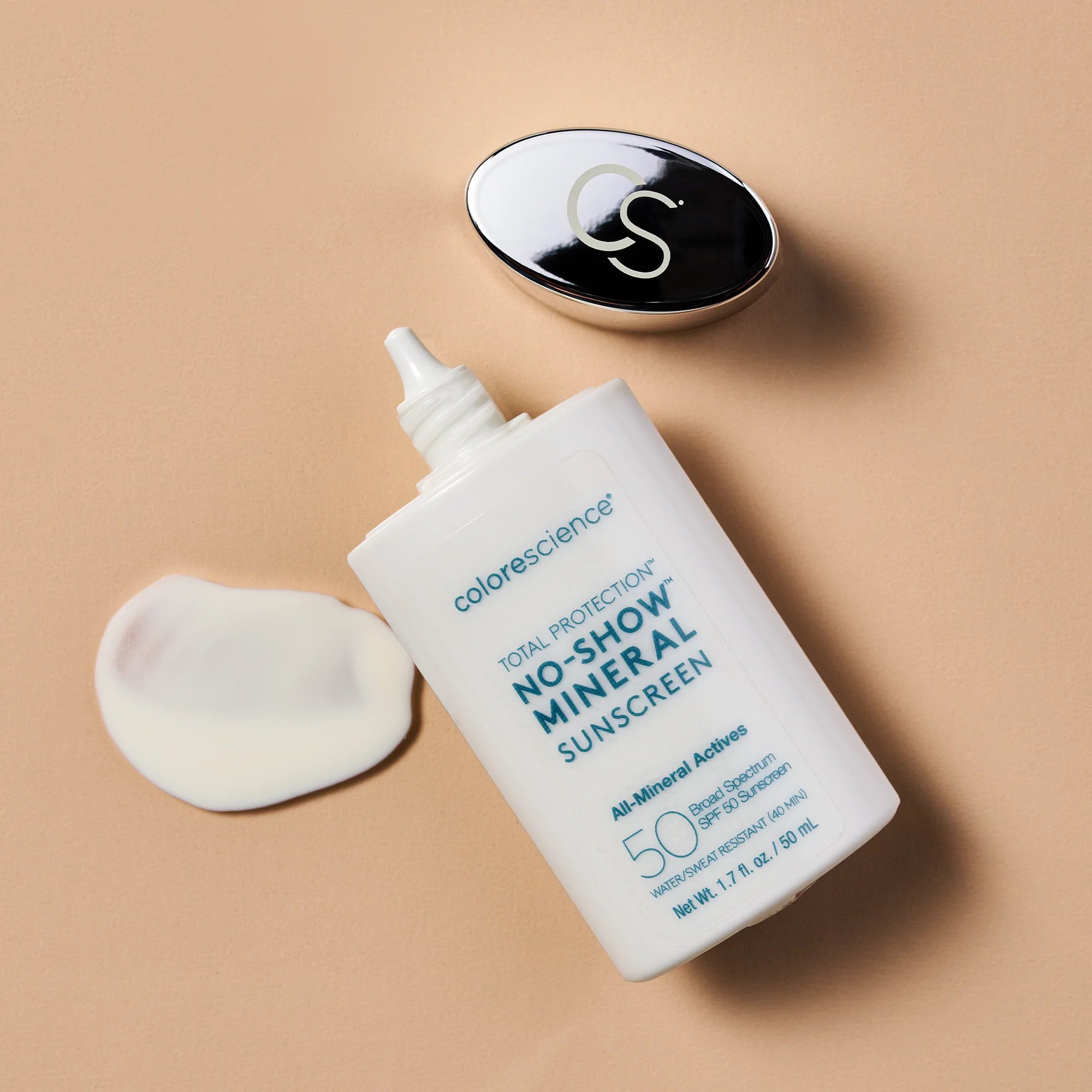 Colorescience no-show mineral sunscreen bottle on a beige background