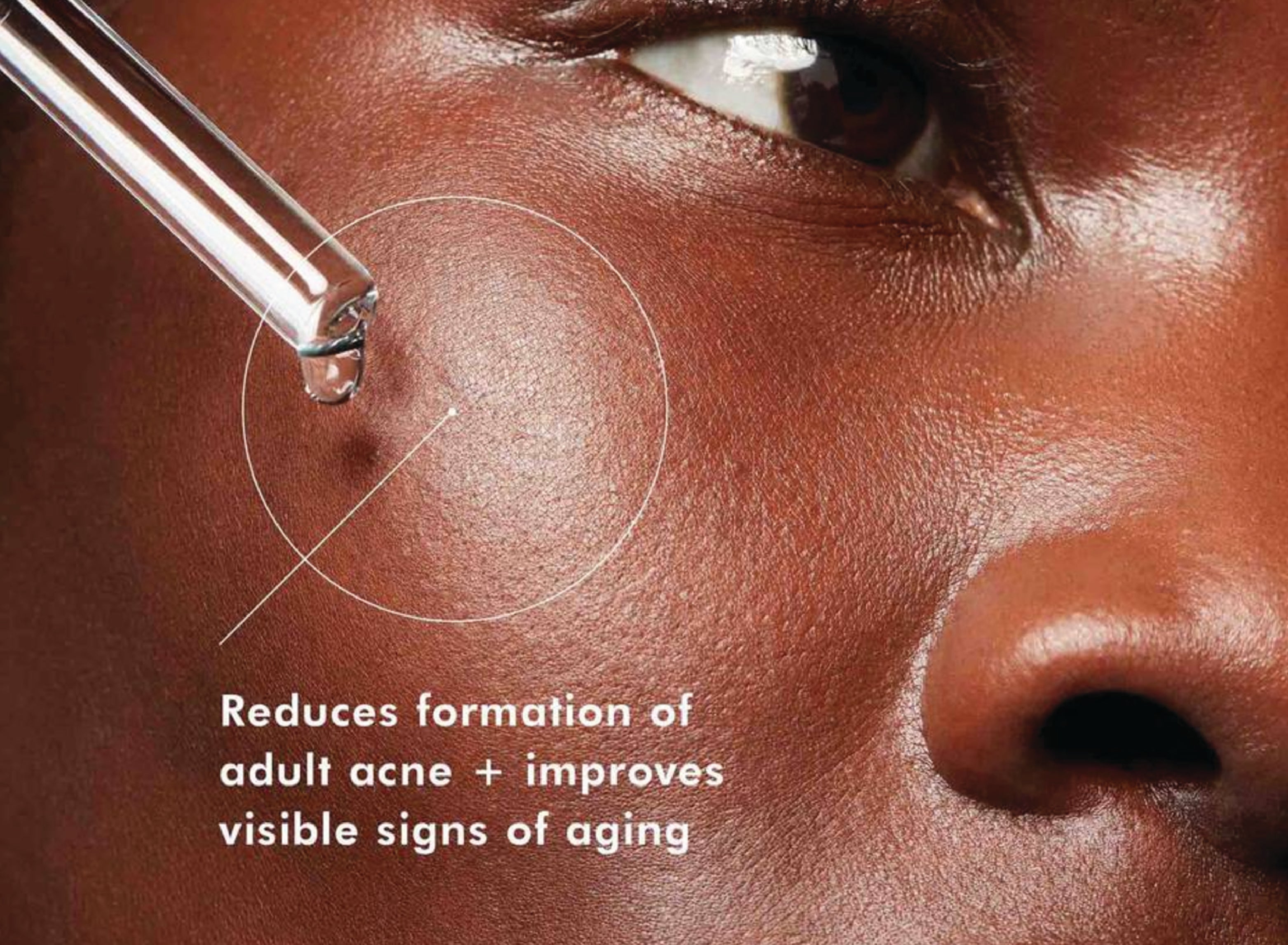 Model using dropper to her cheekbone showcasing benefits