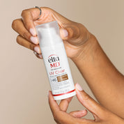 Hands grabbing EltaMD product