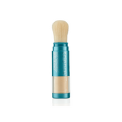 Colorescience brush with blue handle and beige bristles on a white background