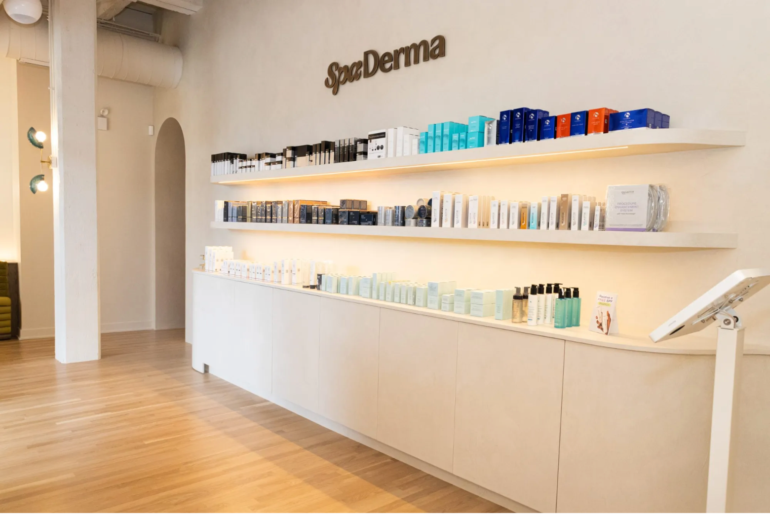 SpaDerma store interior with shelves displaying skincare products.